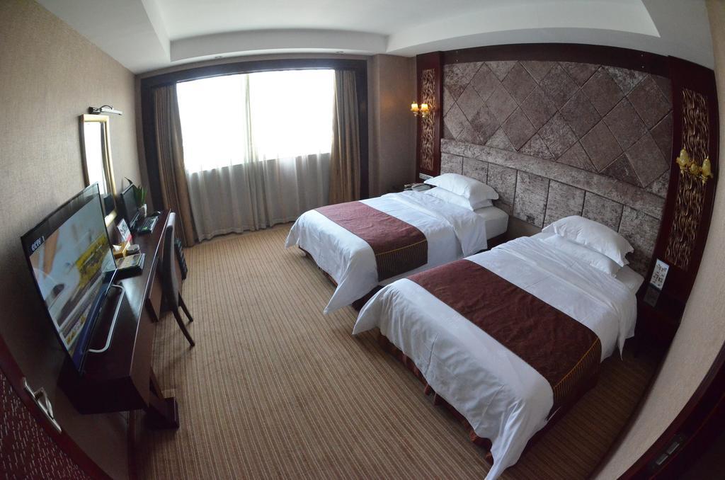 Xiamen Wanjia Oriental Hotel Zimmer foto